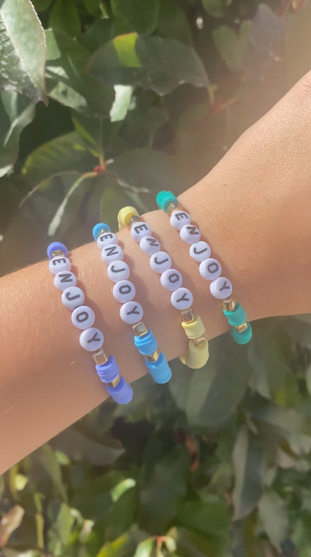 Bracelets perles heishi « enjoy »