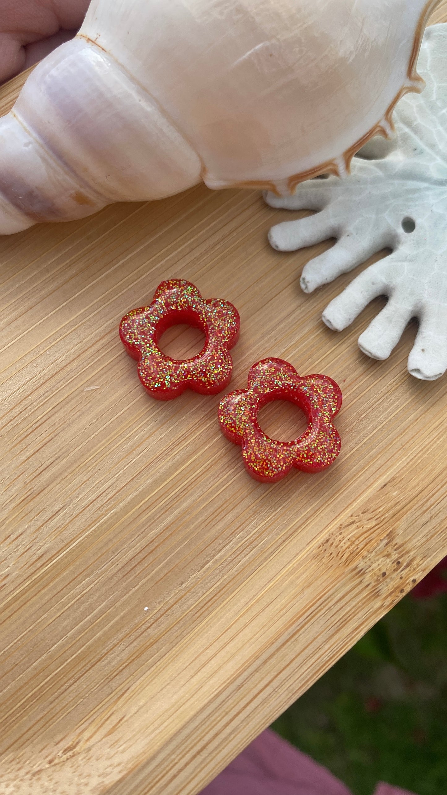 Fleurs pailletées rouges/oranges