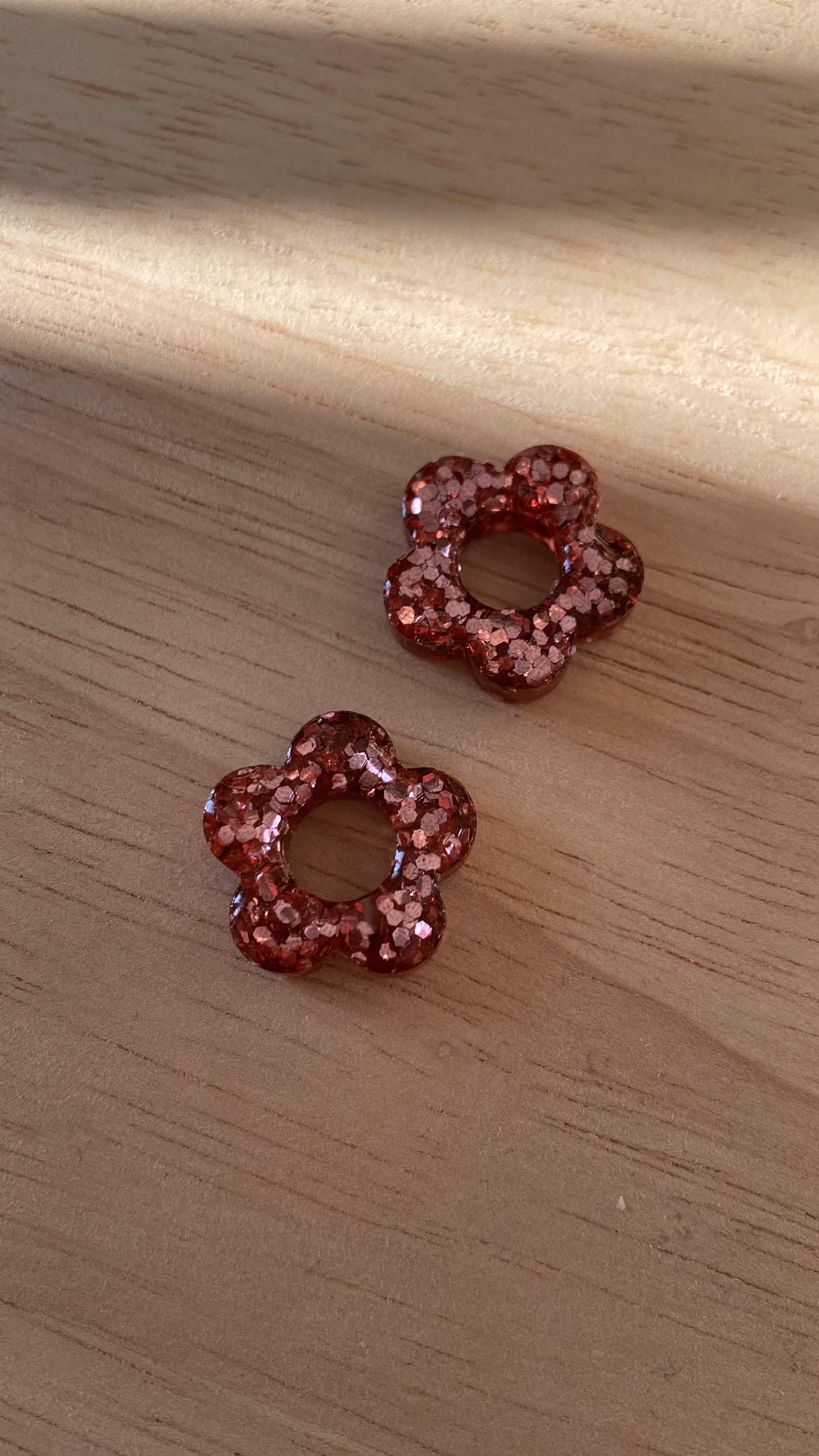 Fleurs paillettes roses