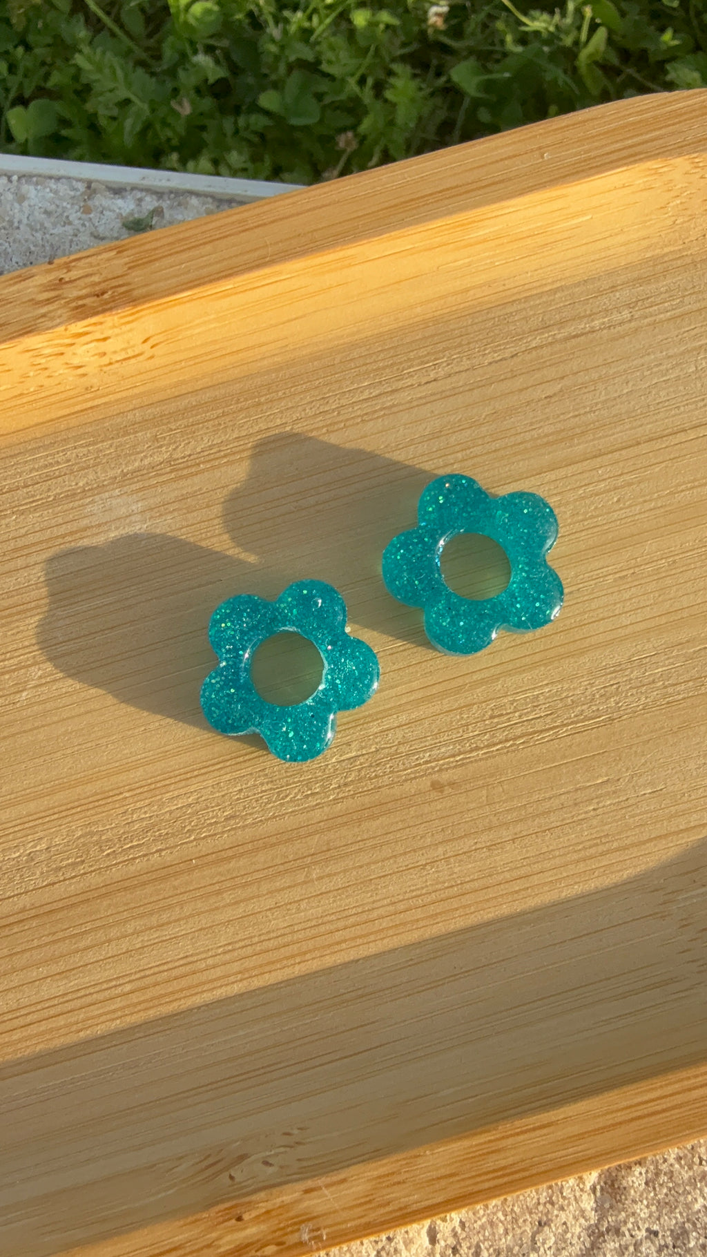 fleurs à paillettes turquoises