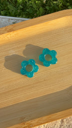 fleurs à paillettes turquoises