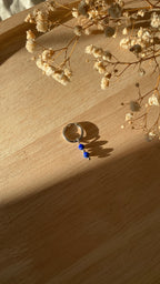 boucle argentée perles bleues