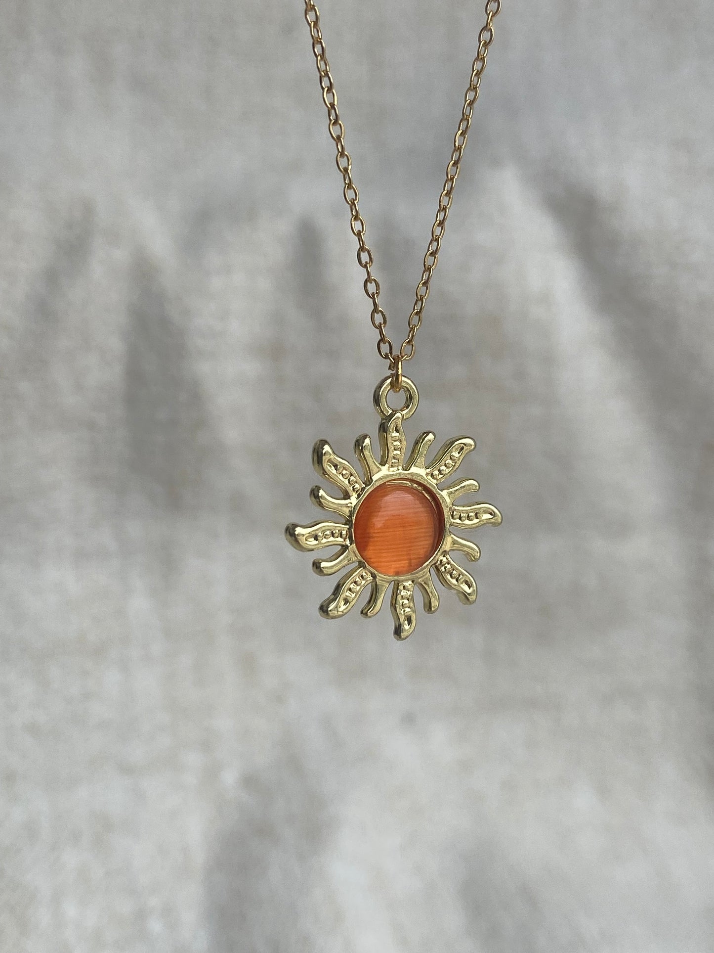 Collier soleil orange
