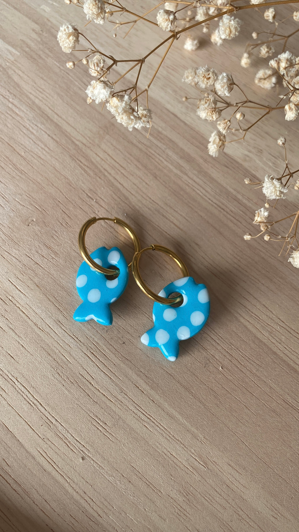 Pampilles poissons bleus poids blancs