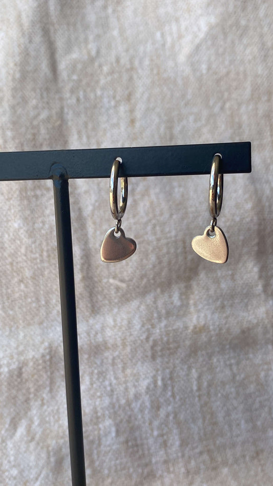 Boucles d'oreilles coeurs argentés