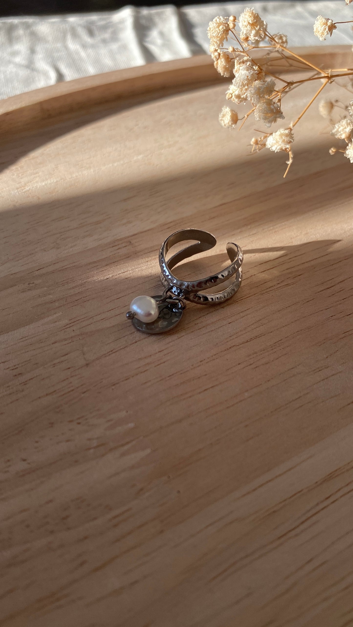 Bague breloques croisée argentée