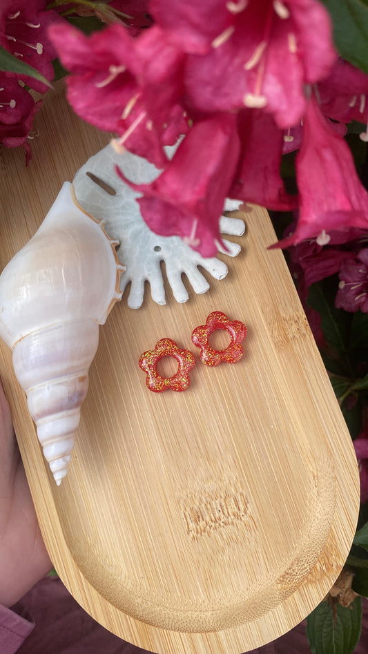 Fleurs pailletées rouges/oranges