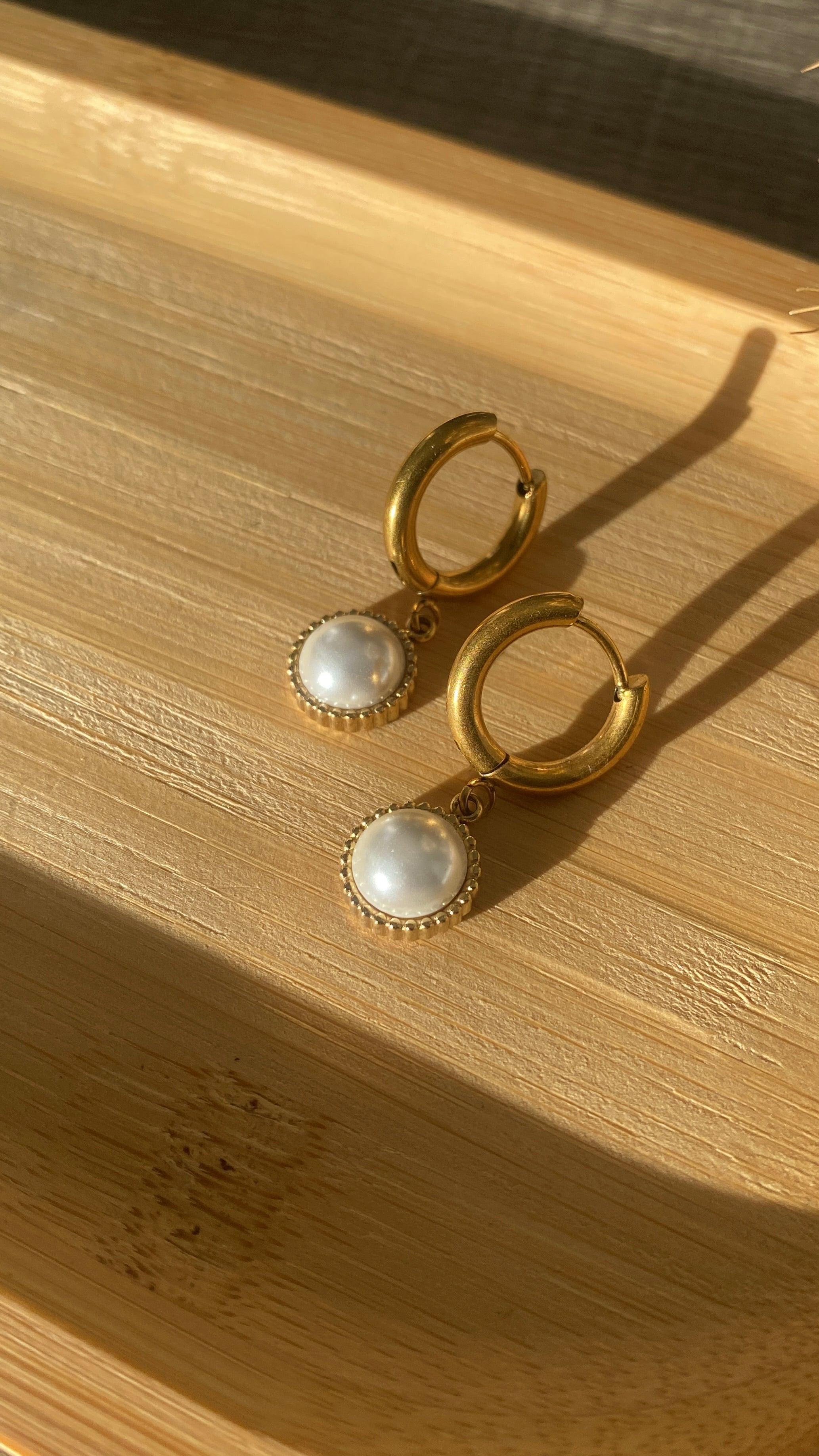 Boucles d’oreilles demi-perles