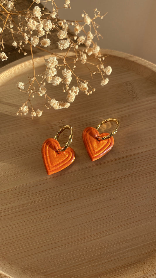 Coeurs oranges irisées