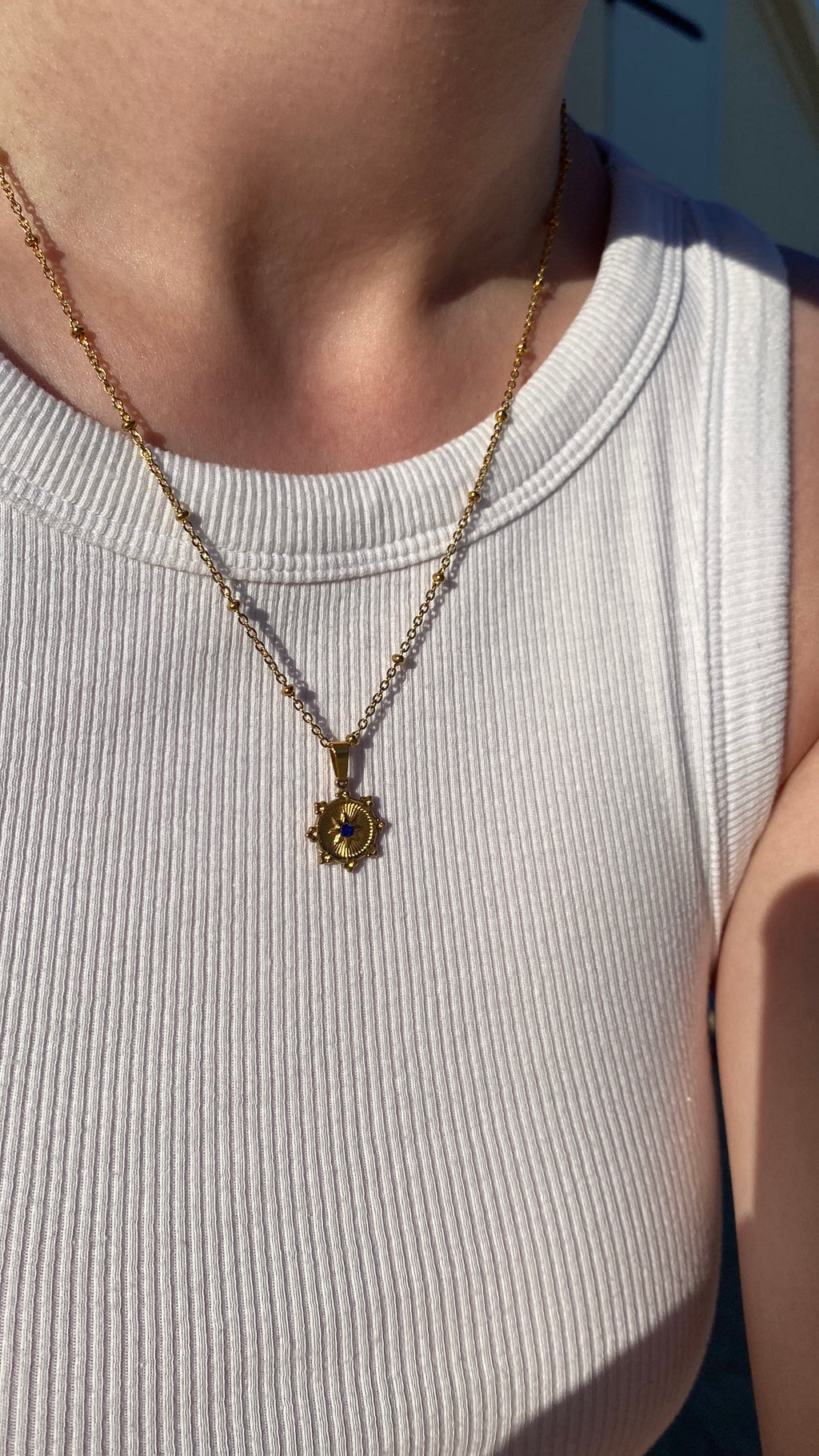 Collier doré zircon bleu