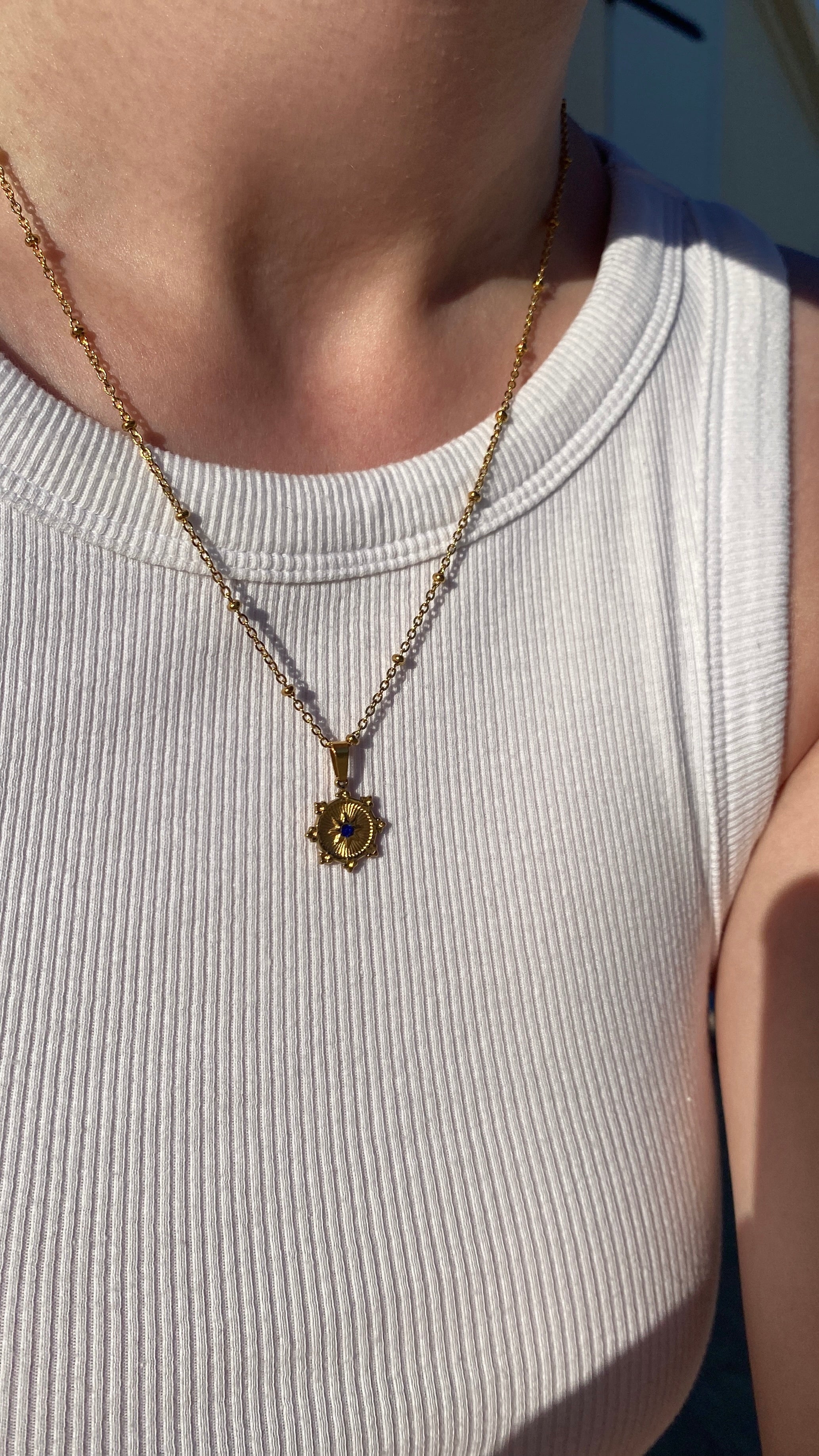 Collier doré zircon bleu