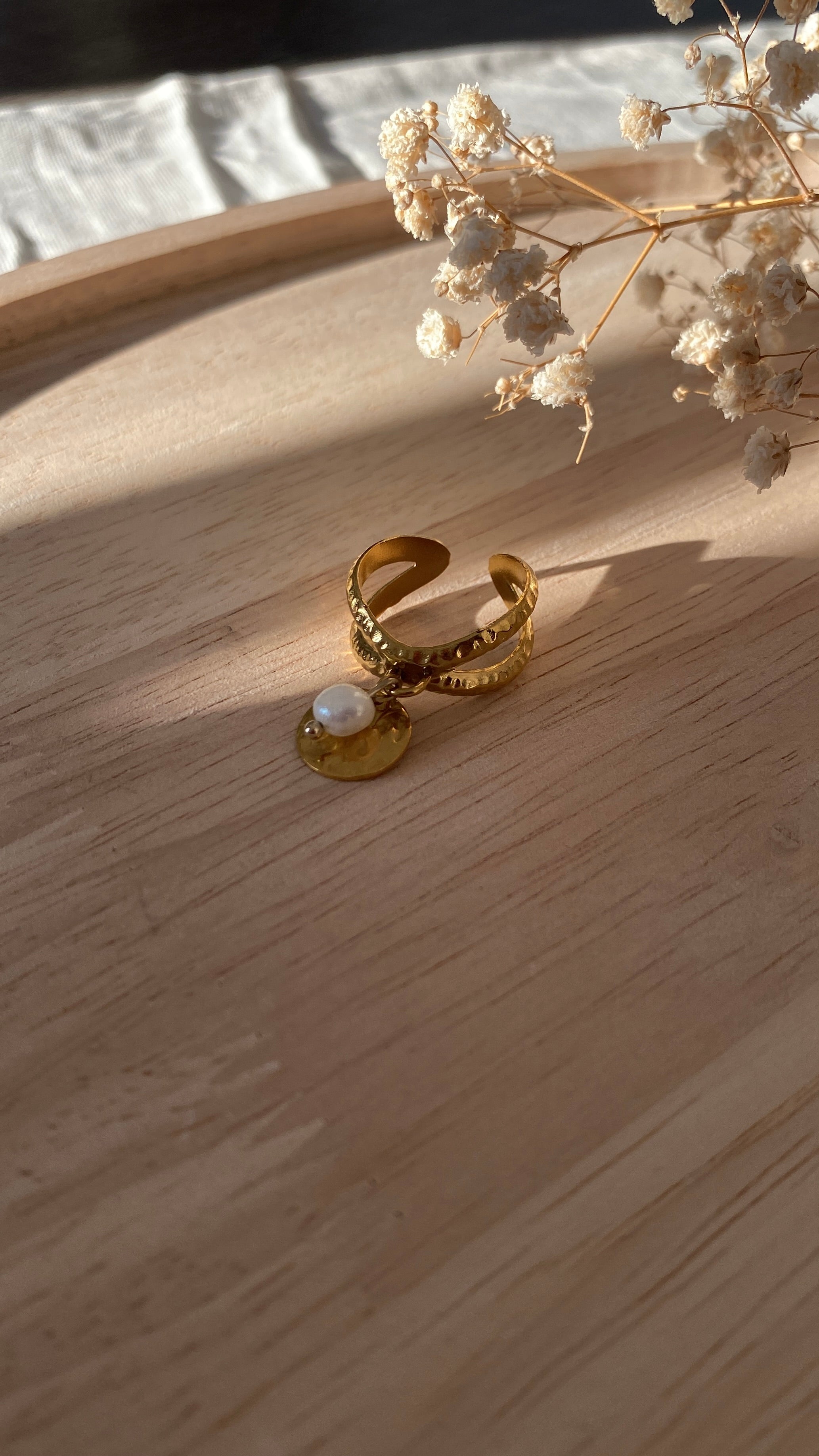 Bague breloques croisée dorée