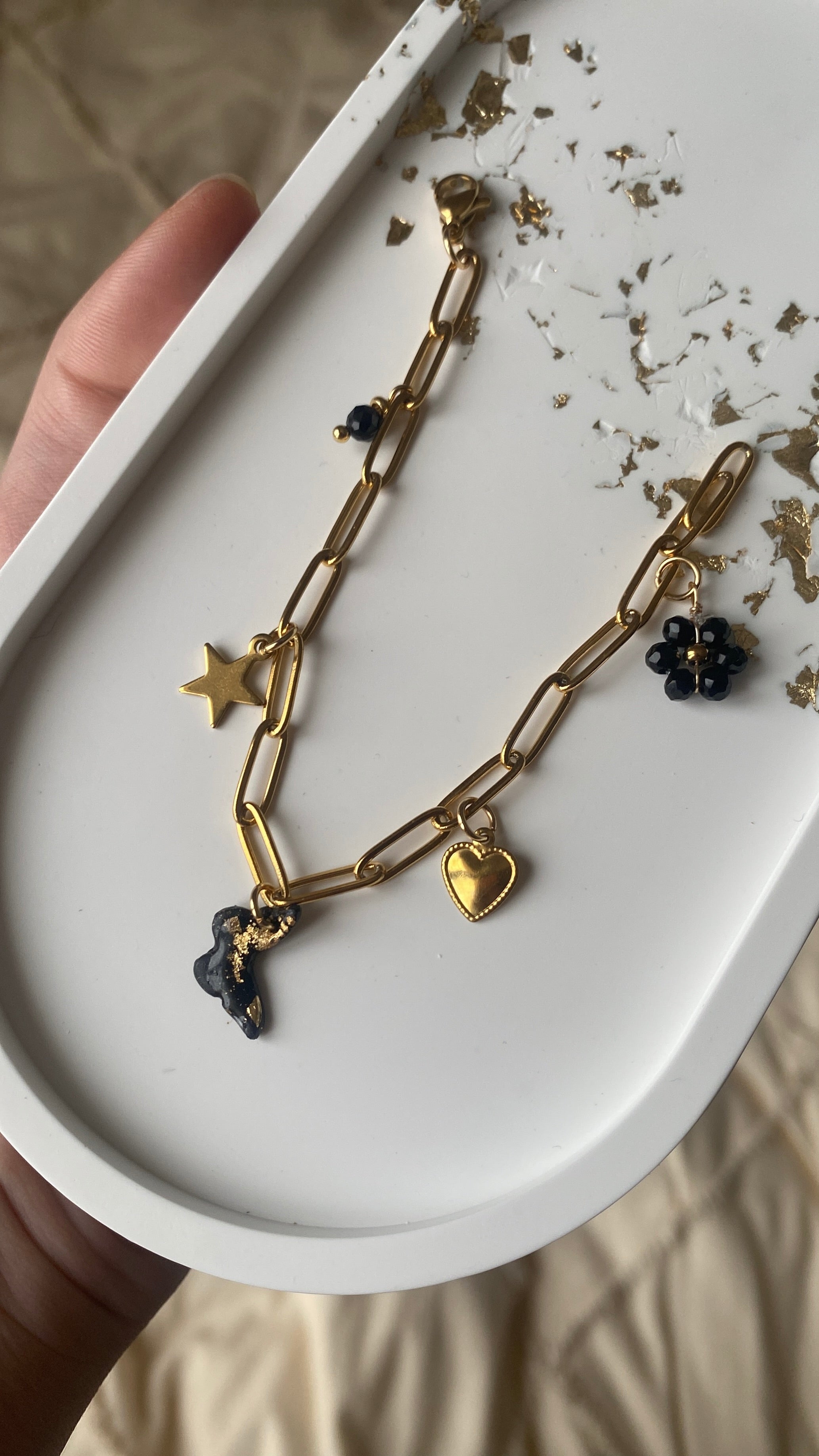 Bracelet breloques noir&doré