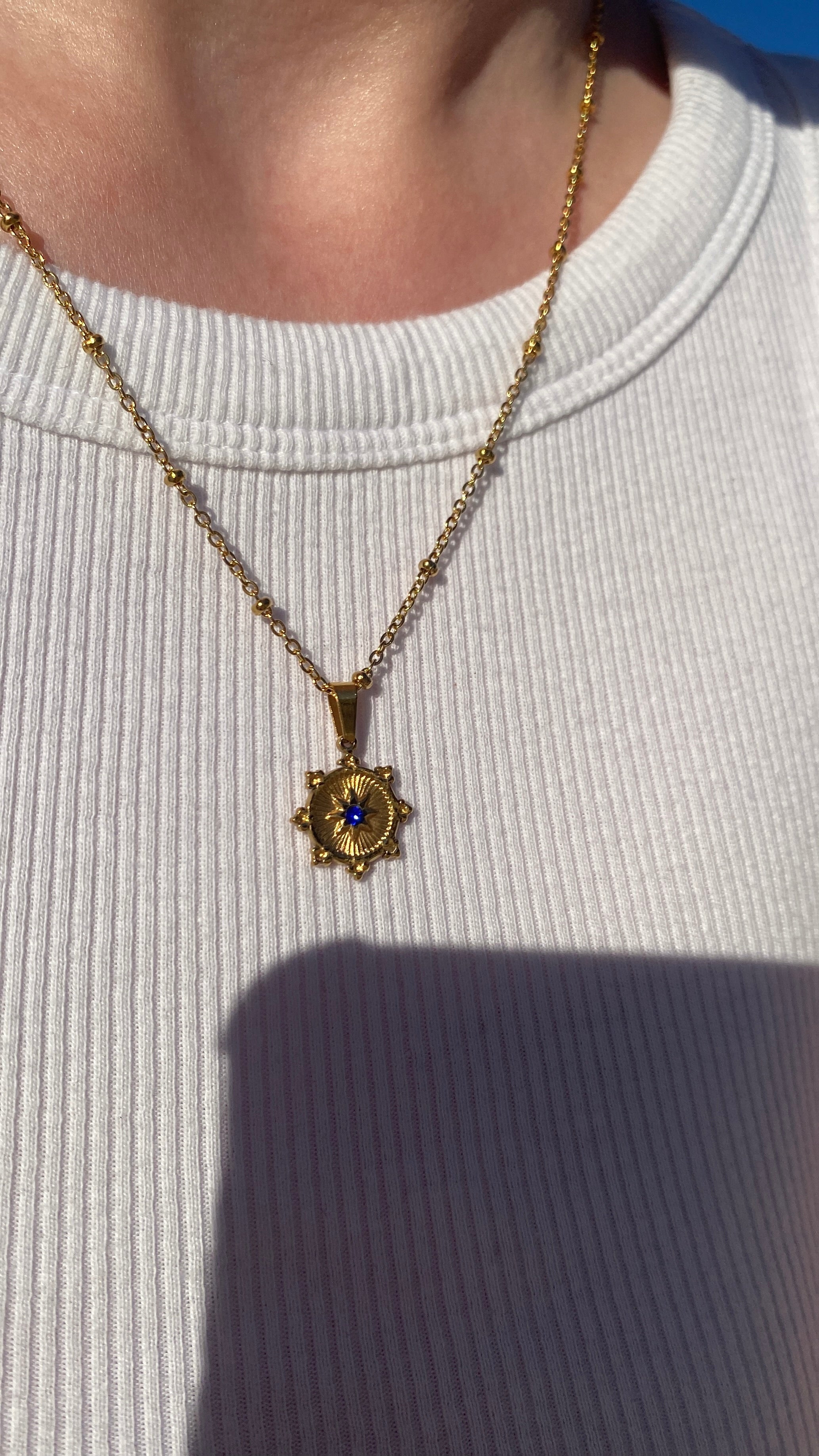 Collier doré zircon bleu