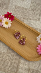 triangles à paillettes roses claires
