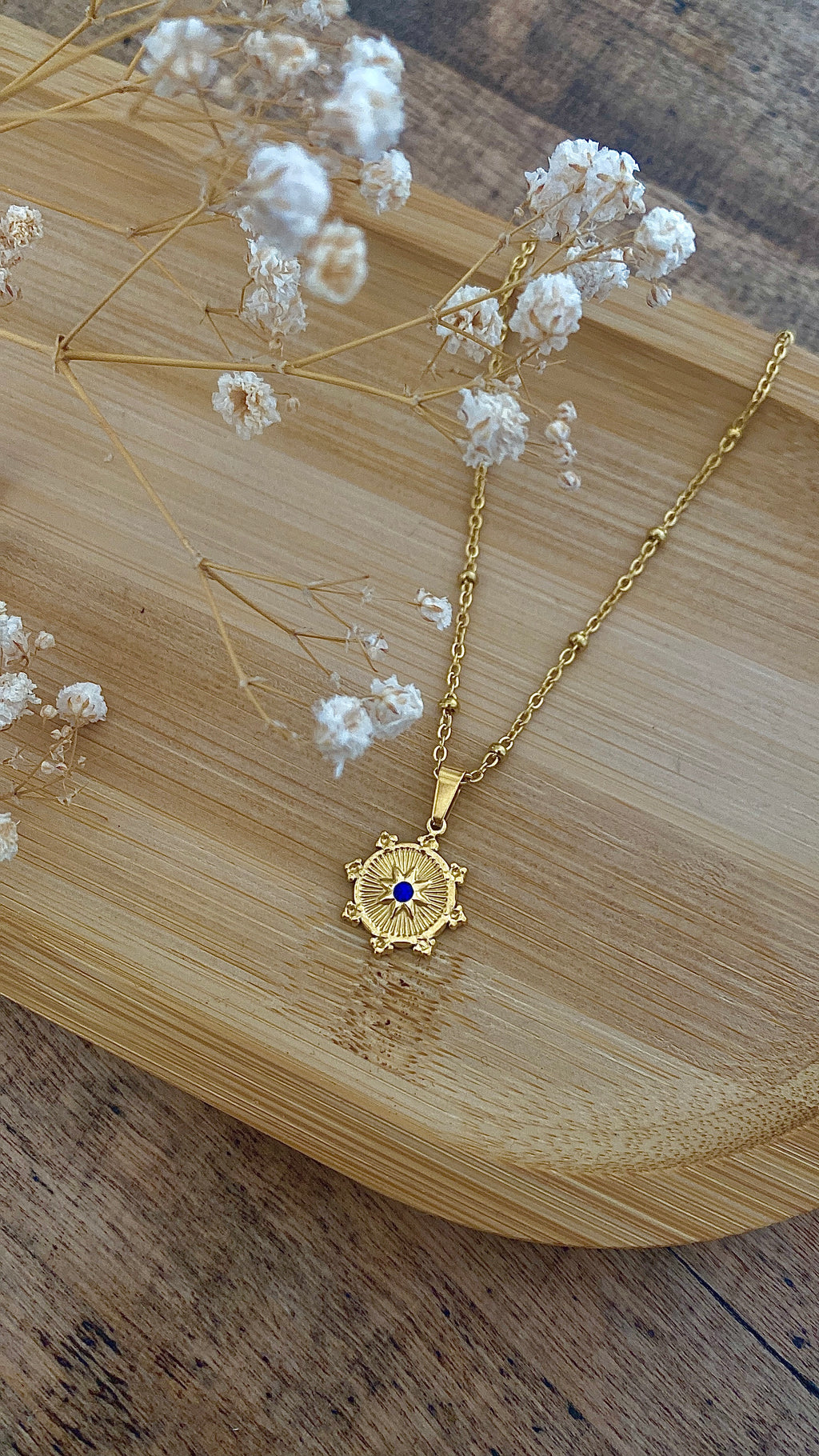 Collier doré zircon bleu