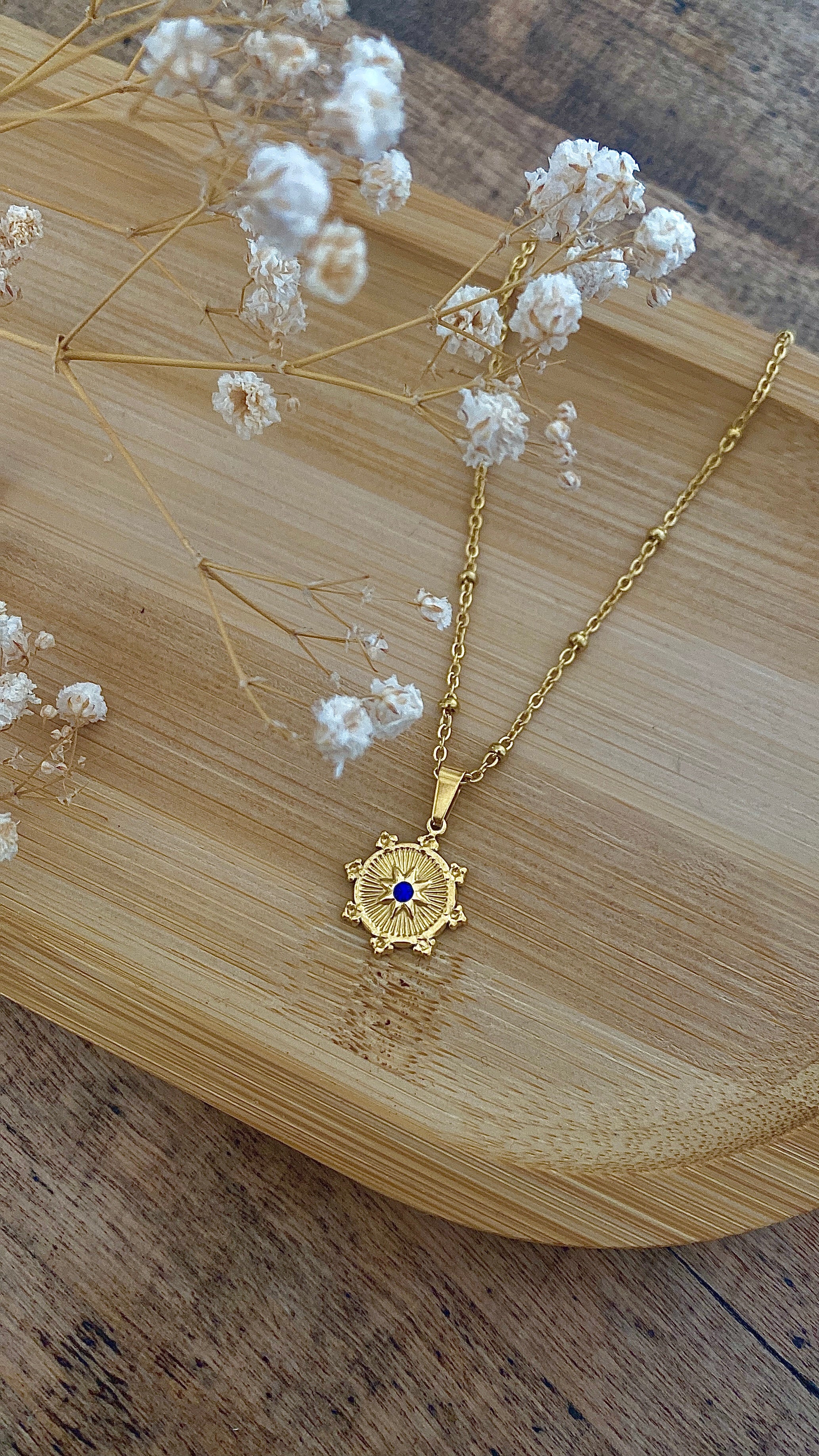 Collier doré zircon bleu