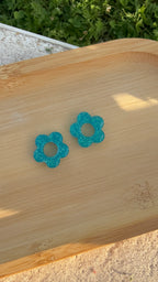 fleurs à paillettes turquoises